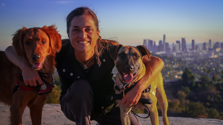 Lisa Filpi, on a trek in Griffith Park with Sandy, a Golden Retriever, and Ruby, a Chow-Shepard mix.